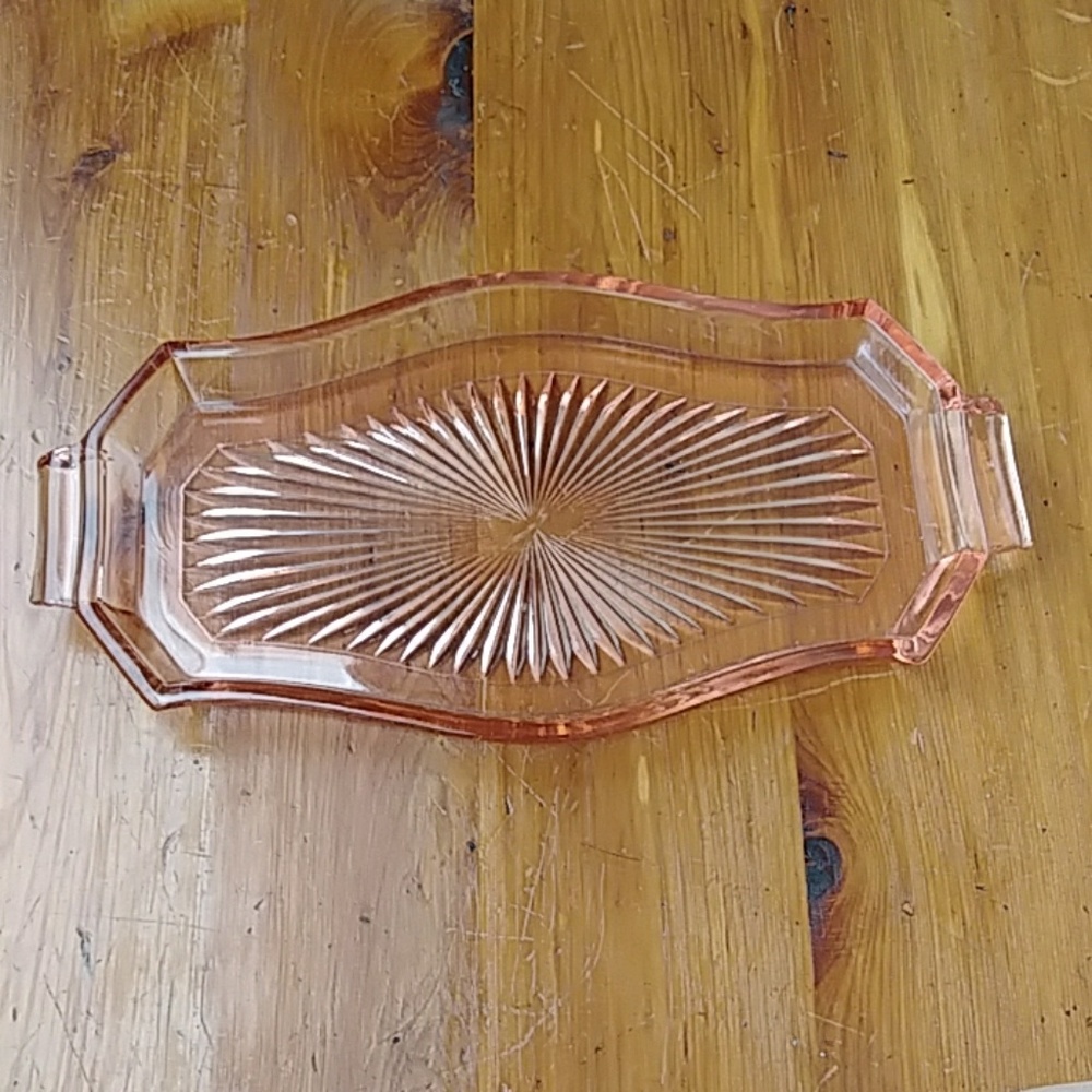 Pink depression glass vanity tray.